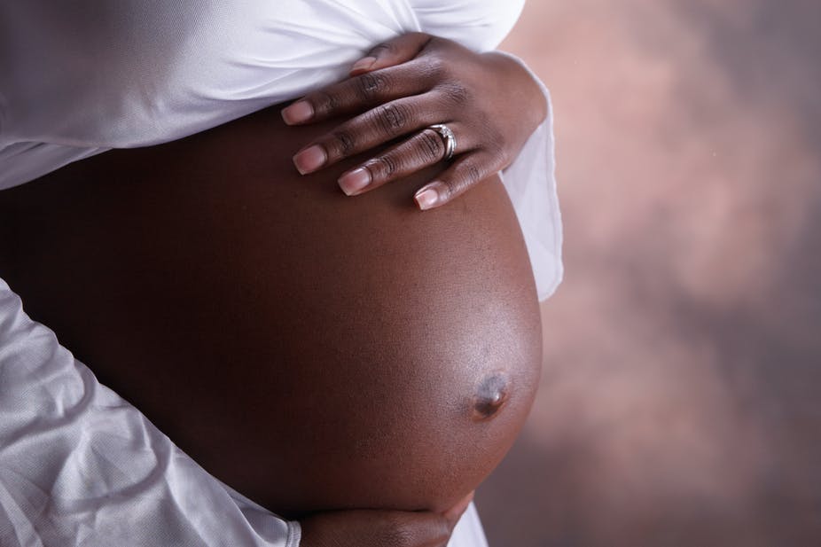 patient-showing-pregnancy-to-nurse-at-abortion-clinic-in oshakati